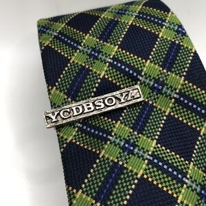 VINTAGE YCDBSOYA Tie Bar Clip Silver Tone with Rustic Background